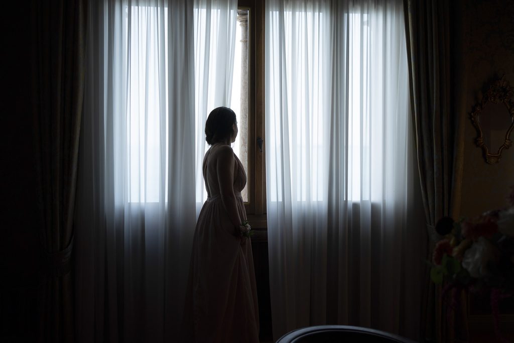 Bride-to-be in a luxury hotel suite on Lake Garda